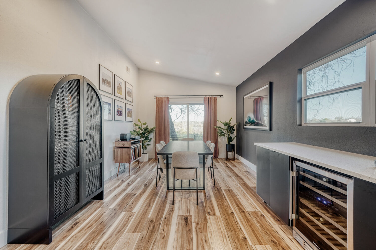 5313 Downs Drive Austin, TX 78721 - Photo 11 of 21 a living room with furniture a fireplace and wooden floor