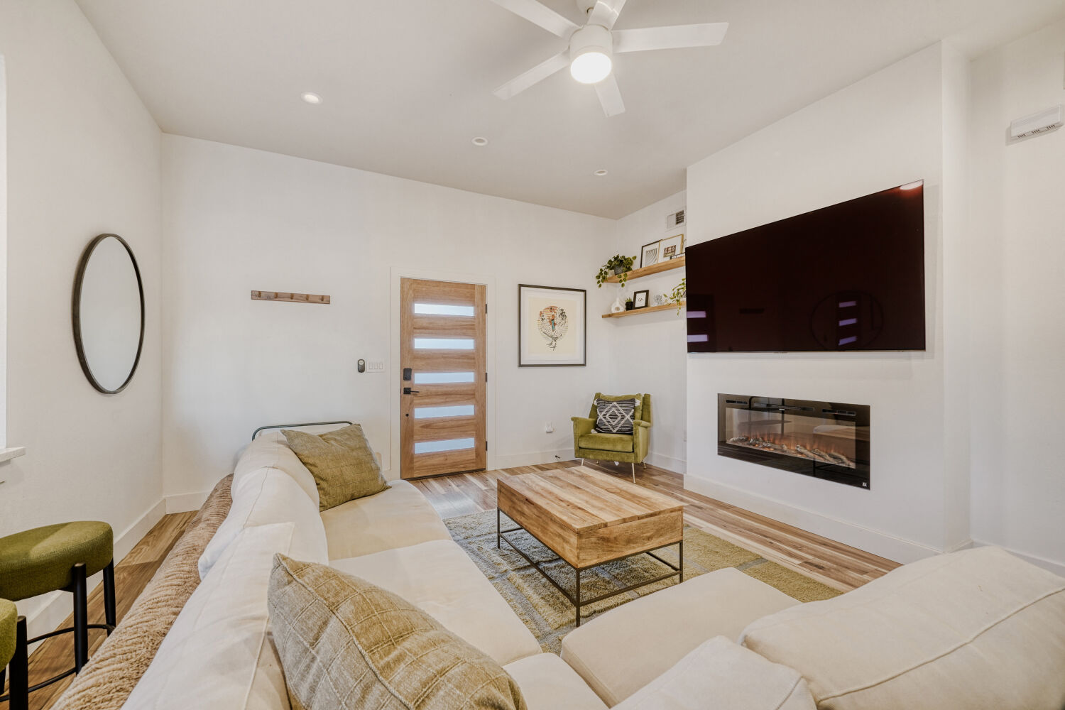 5313 Downs Drive Austin, TX 78721 - Photo 6 of 21 a living room with furniture and a flat screen tv