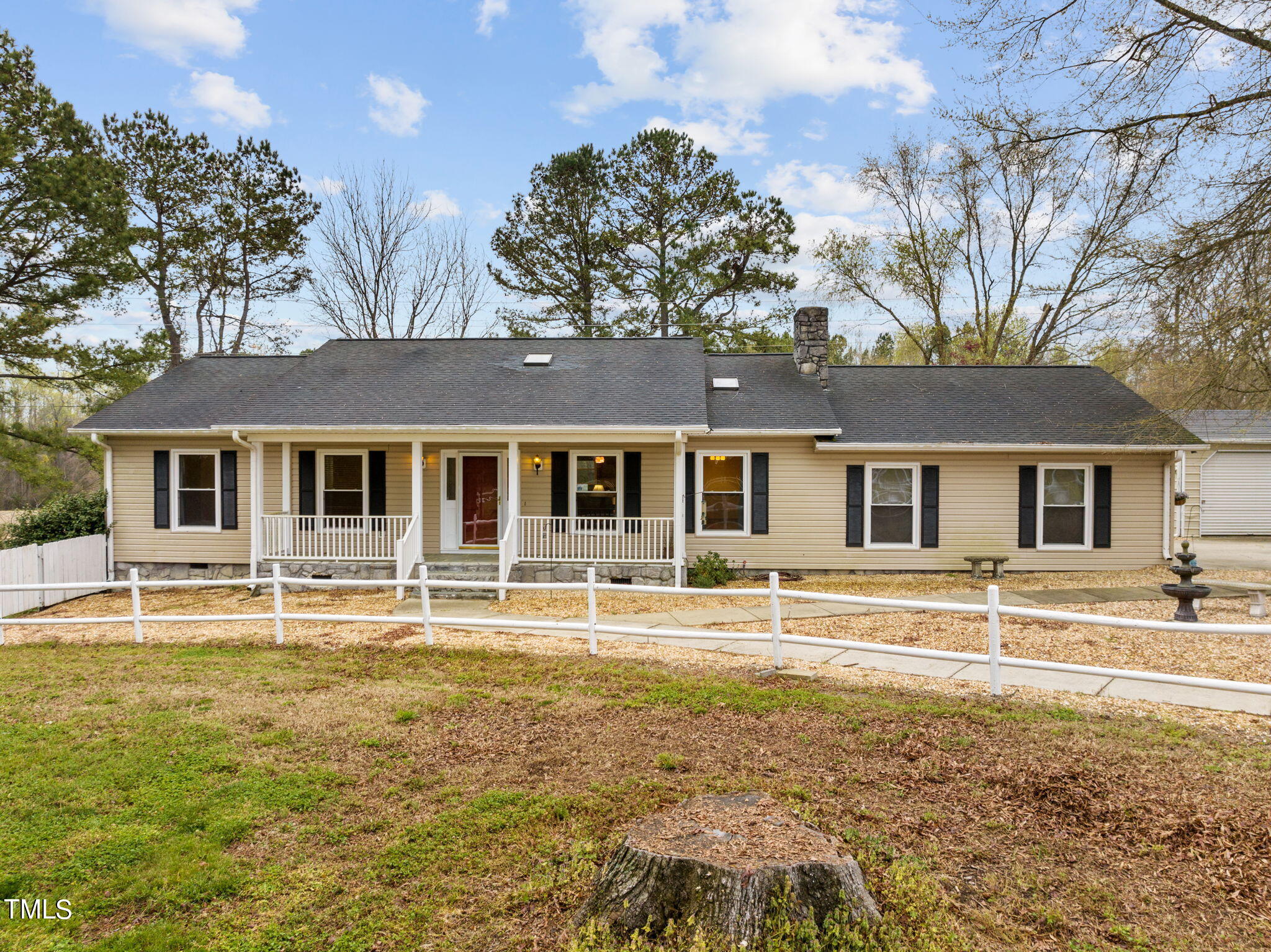 244 Ferrells Bridge Road Bunn, NC 27508 - Photo 1 of 36 a front view of a house with a yard