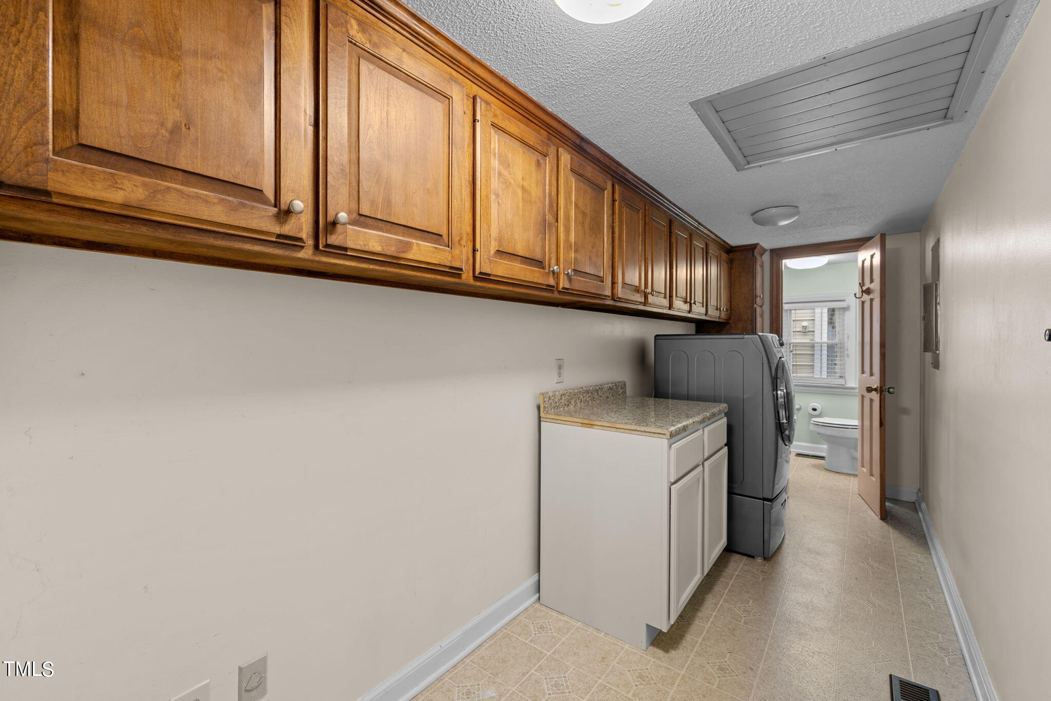 244 Ferrells Bridge Road Bunn, NC 27508 - Photo 19 of 36 a utility room with dryer and washer