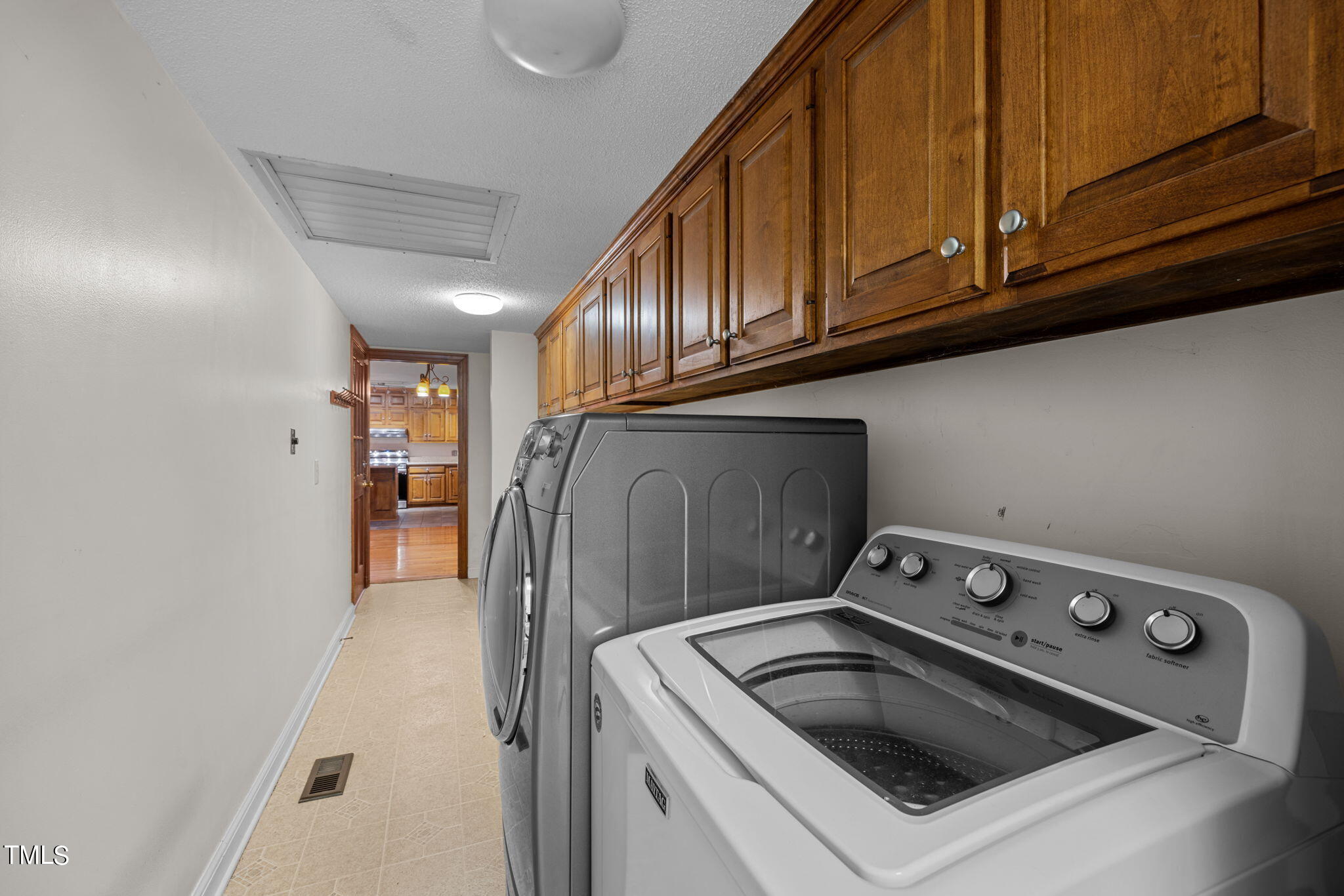 244 Ferrells Bridge Road Bunn, NC 27508 - Photo 20 of 36 a utility room with dryer and washer