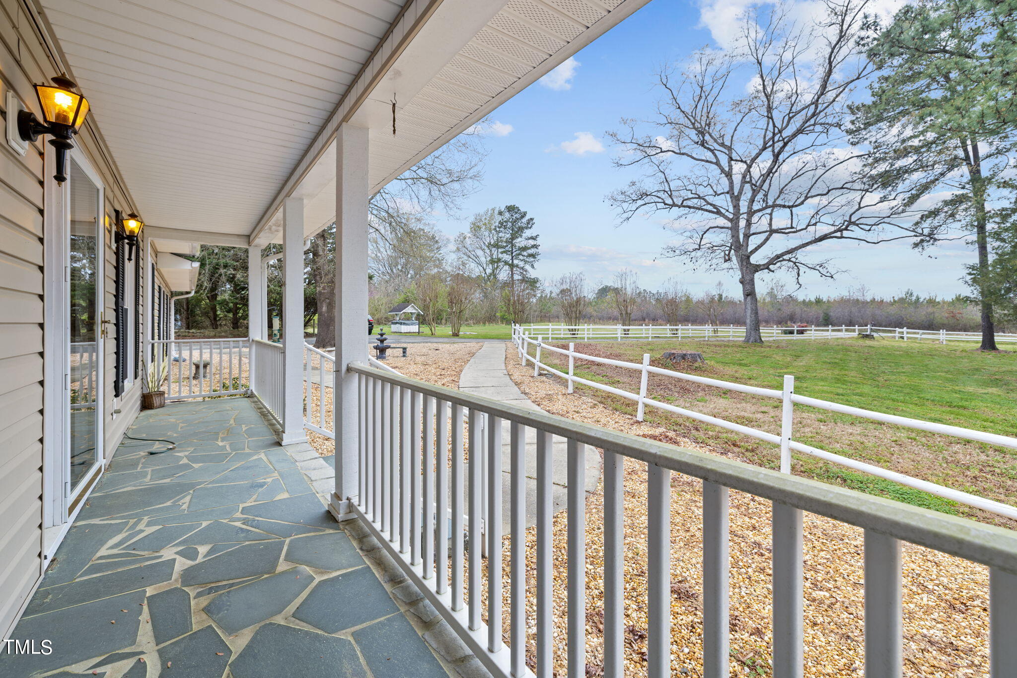 244 Ferrells Bridge Road Bunn, NC 27508 - Photo 2 of 36 a view of a porch
