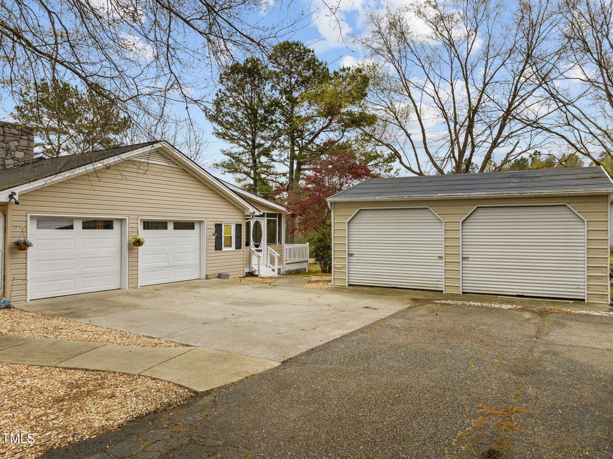 244 Ferrells Bridge Road Bunn, NC 27508 - Photo 25 of 36 a front view of a house with a garage