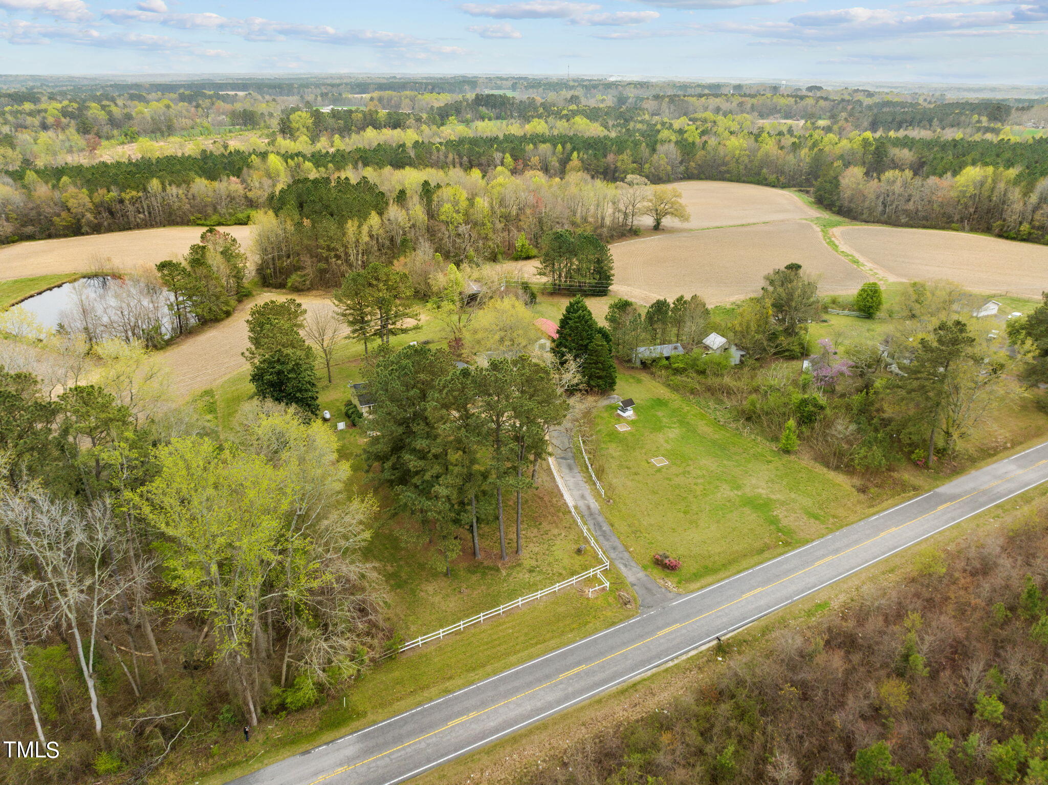 244 Ferrells Bridge Road Bunn, NC 27508 - Photo 33 of 36 a view of a lake from a balcony