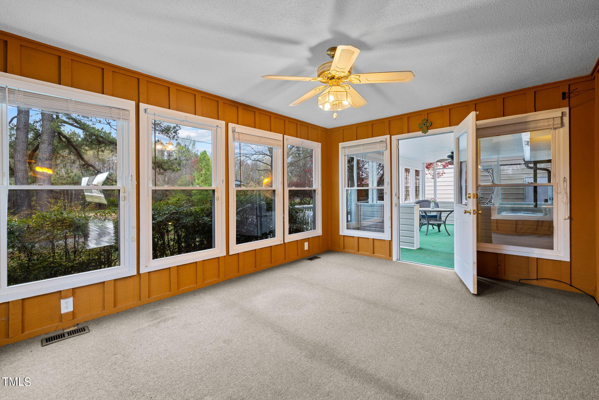 244 Ferrells Bridge Road Bunn, NC 27508 - Photo 9 of 36 a view of an empty room with a window