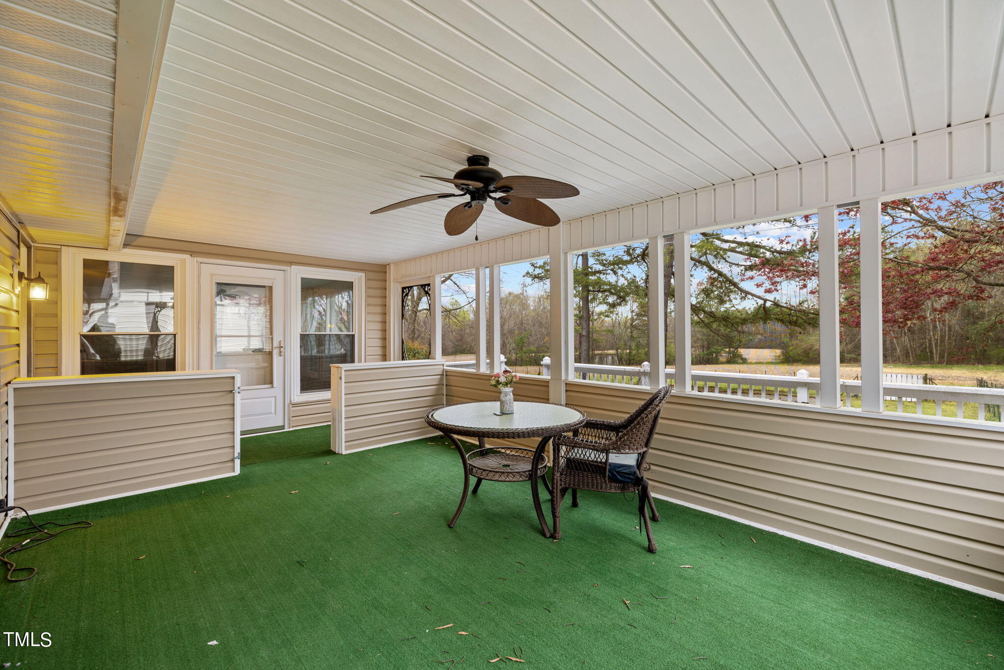 244 Ferrells Bridge Road Bunn, NC 27508 - Photo 10 of 36 a view of a patio with table and chairs