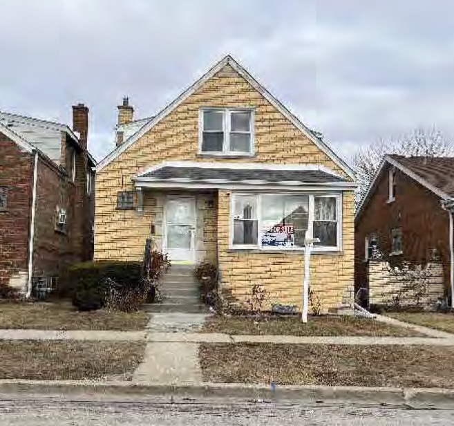 7330 West 61st Place Summit, IL 60501 - Photo 2 of 3 a front view of a house