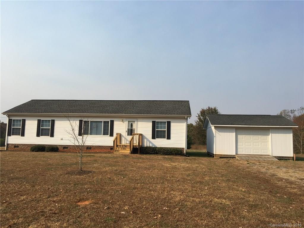 4860 Yoder Road Crouse, NC 28033 - Photo 1 of 20 front view of house with a yard