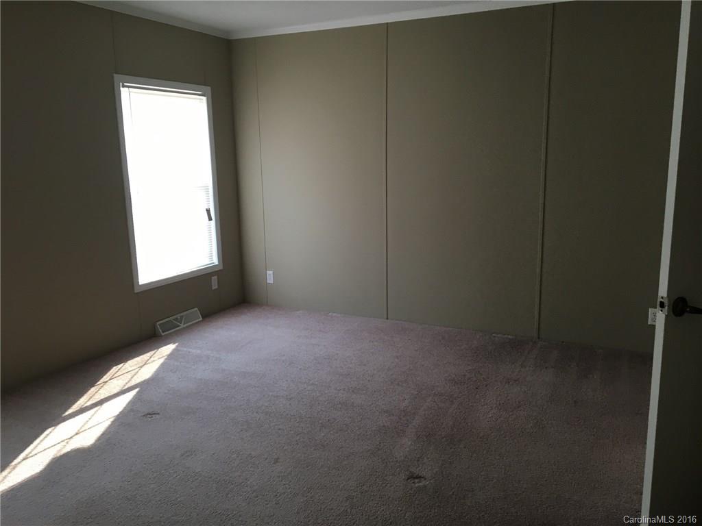 4860 Yoder Road Crouse, NC 28033 - Photo 14 of 20 a view of an empty room with a window