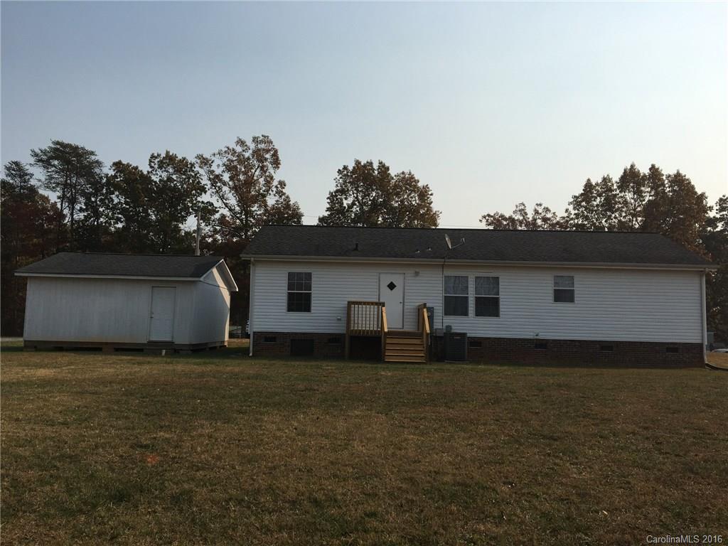 4860 Yoder Road Crouse, NC 28033 - Photo 4 of 20 a house that has a backyard