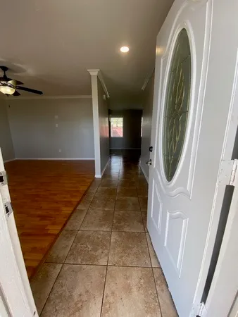 a view of a hallway with washer and dryer
