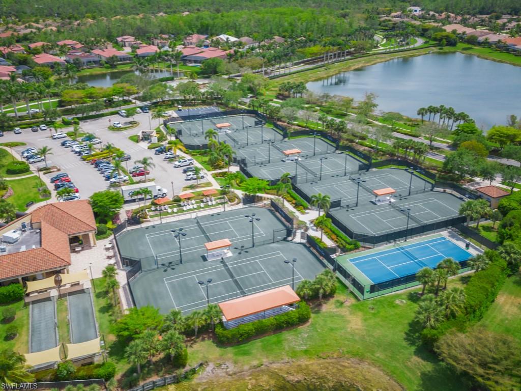9532 Avellino Way, Unit 2726 Naples, FL 34113 - Photo 25 of 35 Aerial view of residential area with a nearby body of water