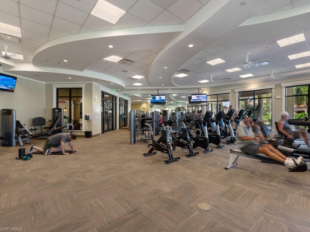 9532 Avellino Way, Unit 2726 Naples, FL 34113 - Photo 32 of 35 Exercise room featuring a paneled ceiling