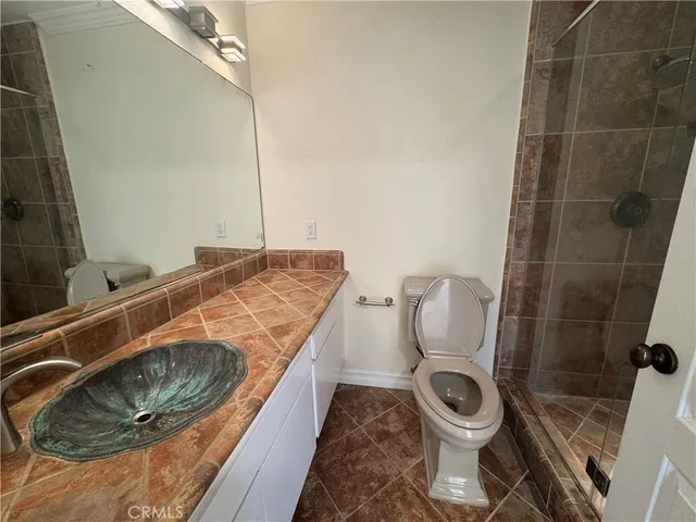 a bathroom with a toilet and a sink