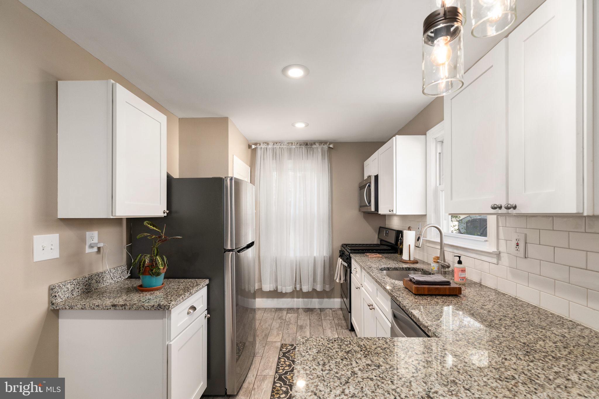 2613 Linwood Road Baltimore, MD 21234 - Photo 10 of 37 Granite kitchen counters and updated appliances
