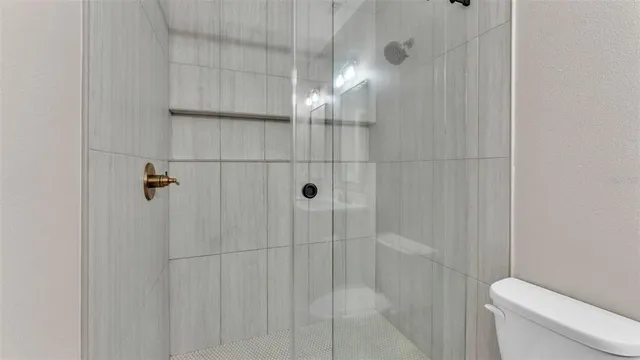 a view of hallway with washer and dryer