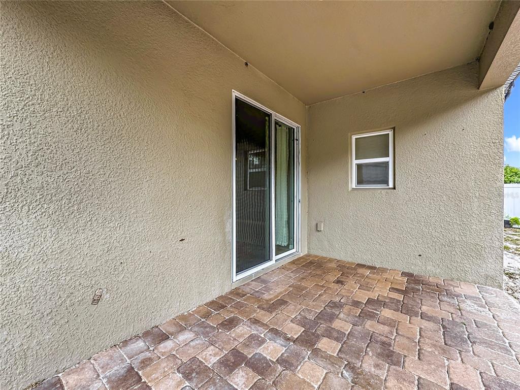 3477 Middlebrook Place Harmony, FL 34773 - Photo 46 of 78 a view of a big room with a chandelier fan