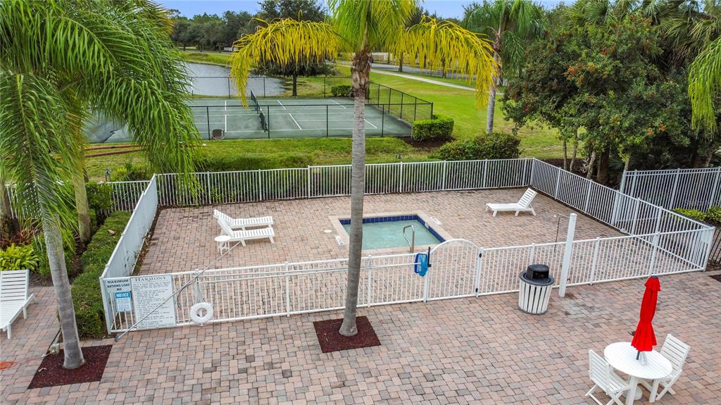 3477 Middlebrook Place Harmony, FL 34773 - Photo 70 of 78 a view of a chairs and table in the patio