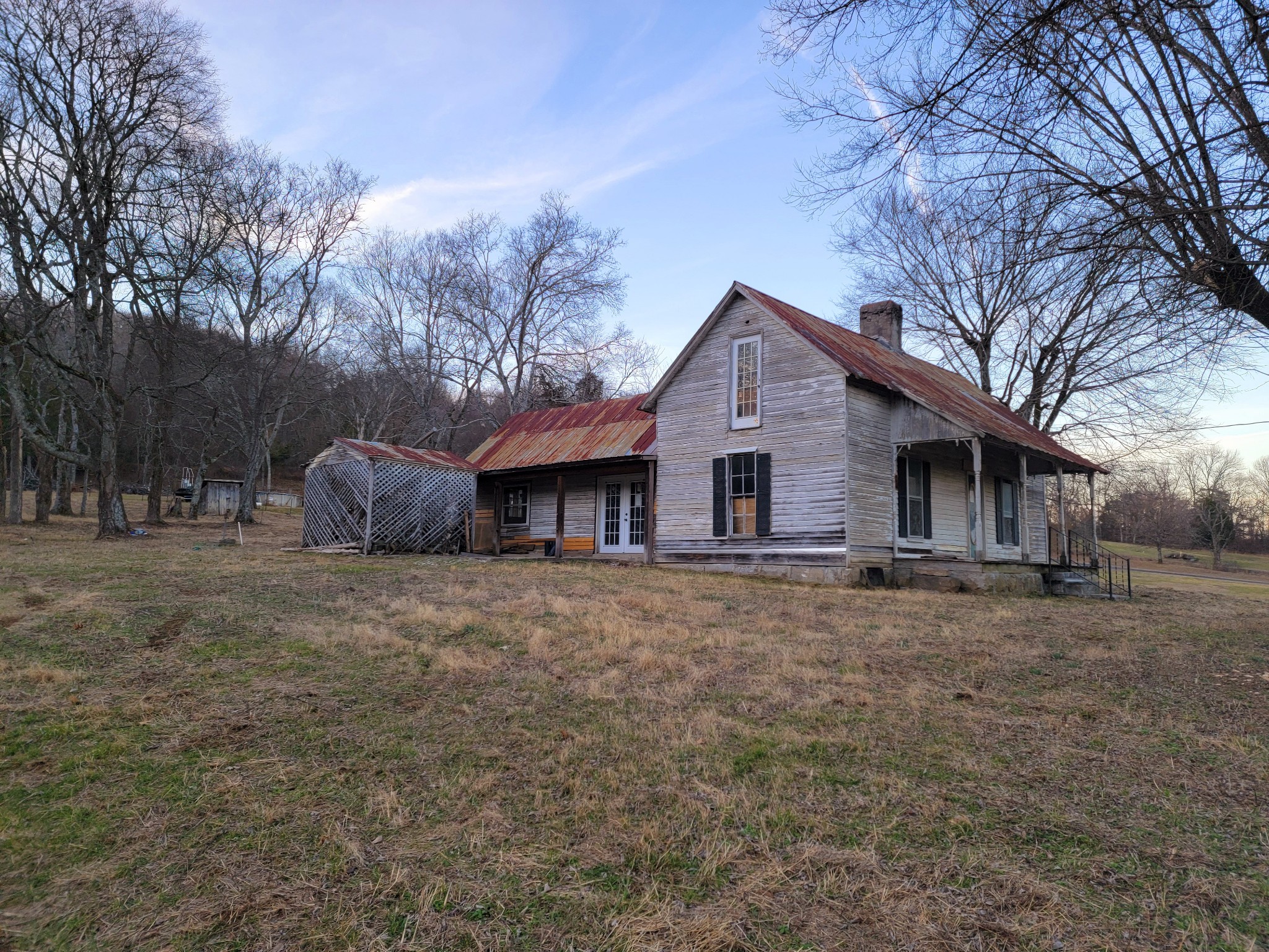 135 Lock 7 Lane Carthage, TN 37030 - Photo 2 of 19 a front view of house with yard and trees
