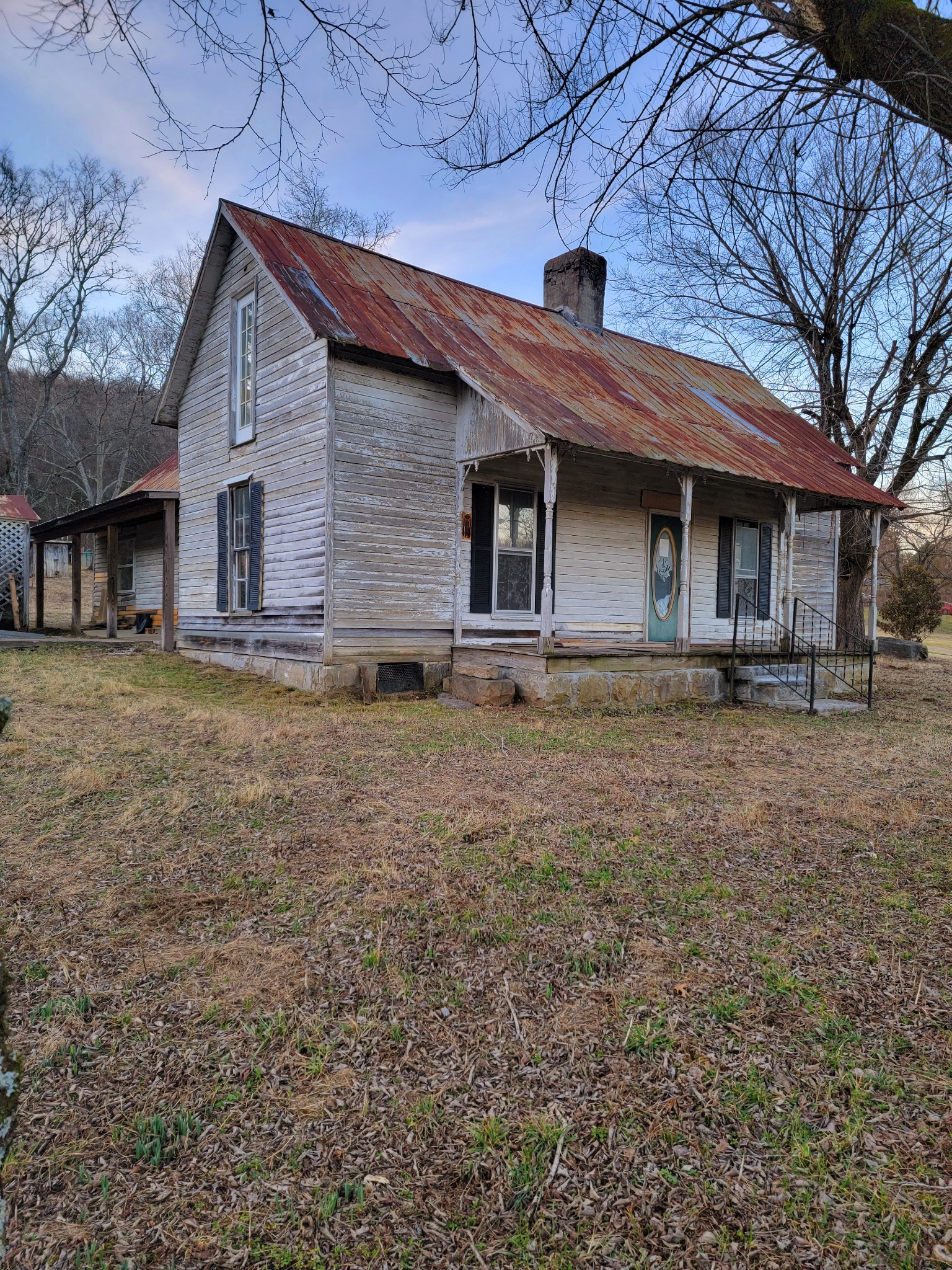 135 Lock 7 Lane Carthage, TN 37030 - Photo 3 of 19 a front view of a house with a yard