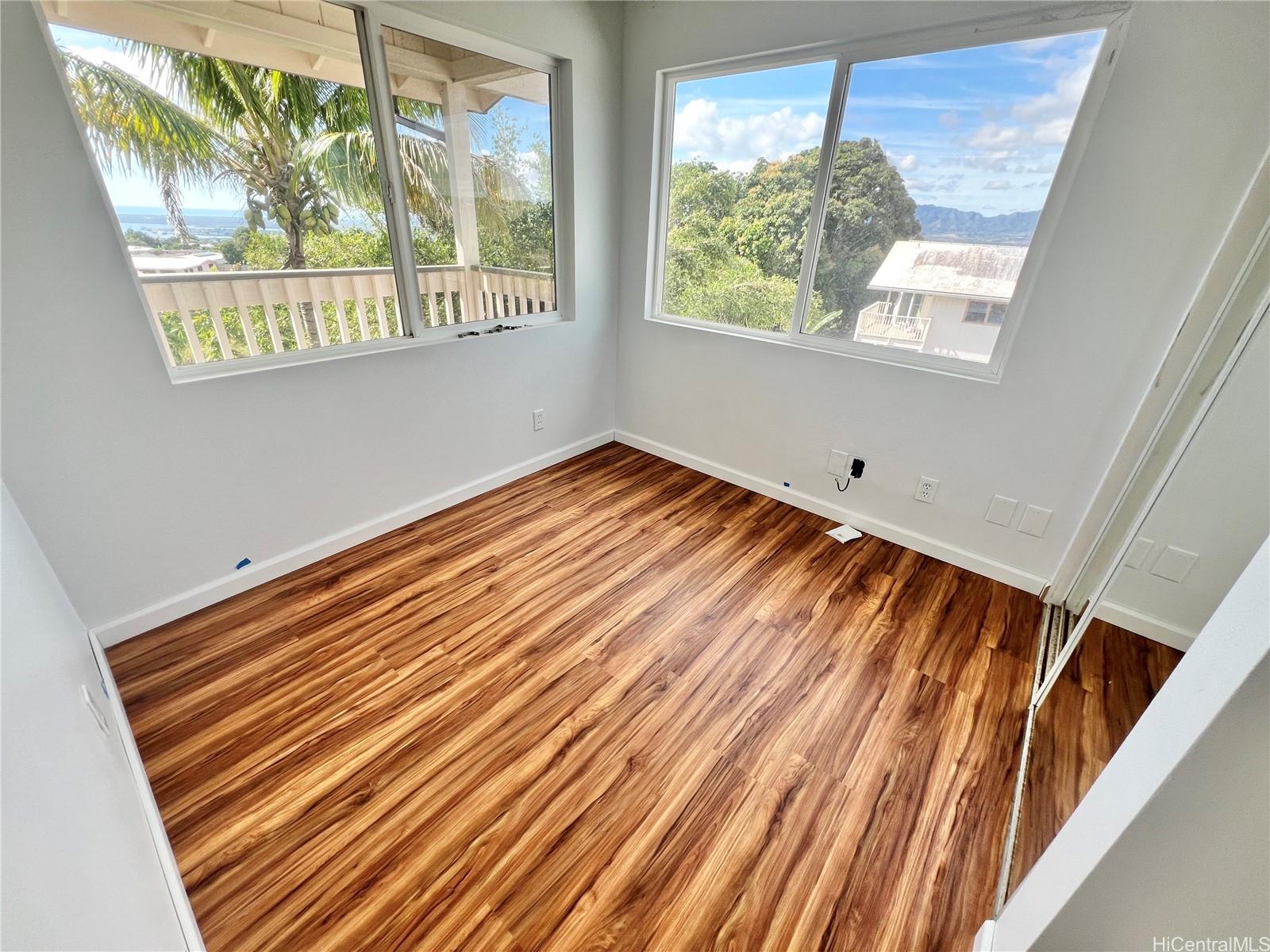 2407 Komo Mai Drive Pearl City, HI 96782 - Photo 13 of 25 a view of an empty room with a window
