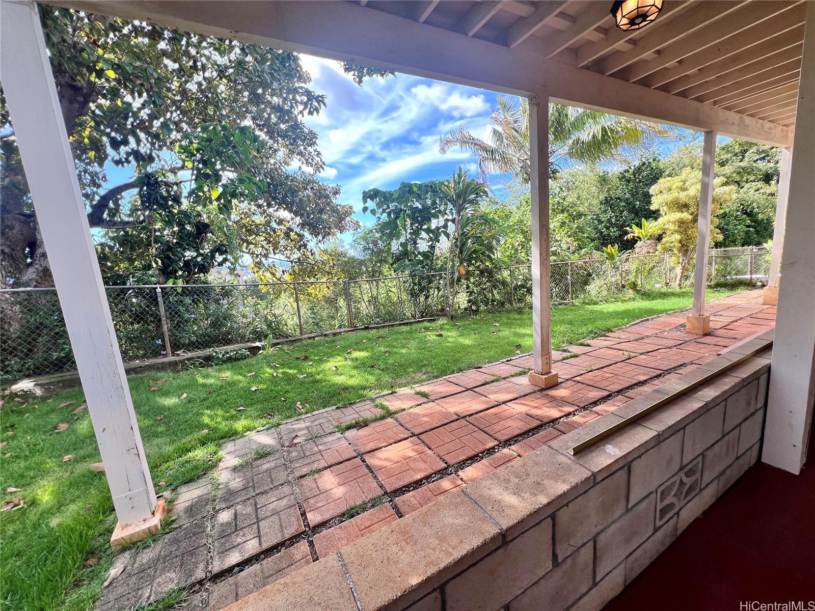 2407 Komo Mai Drive Pearl City, HI 96782 - Photo 22 of 25 a view of yard with patio