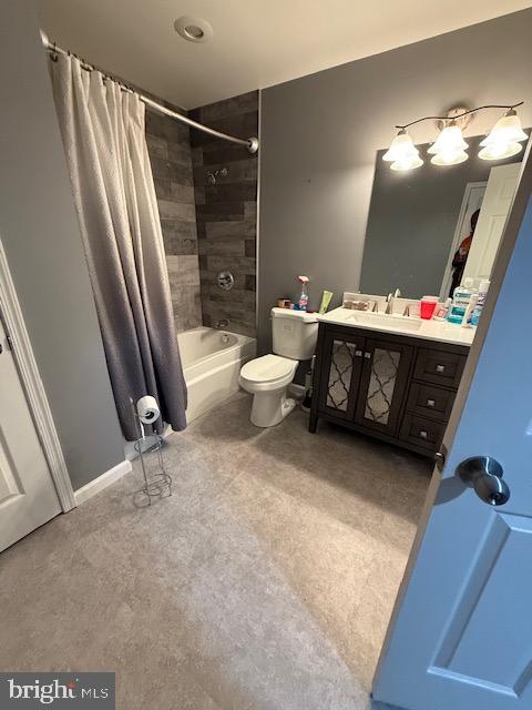 7106 Battle Field Loop Brandywine, MD 20613 - Photo 11 of 22 a bathroom with a sink a toilet and a mirror