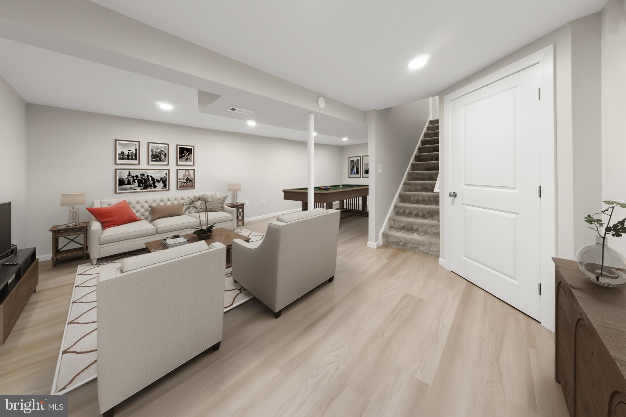 10220 Capitol View Avenue Silver Spring, MD 20910 - Photo 60 of 63 a living room with furniture and wooden floor