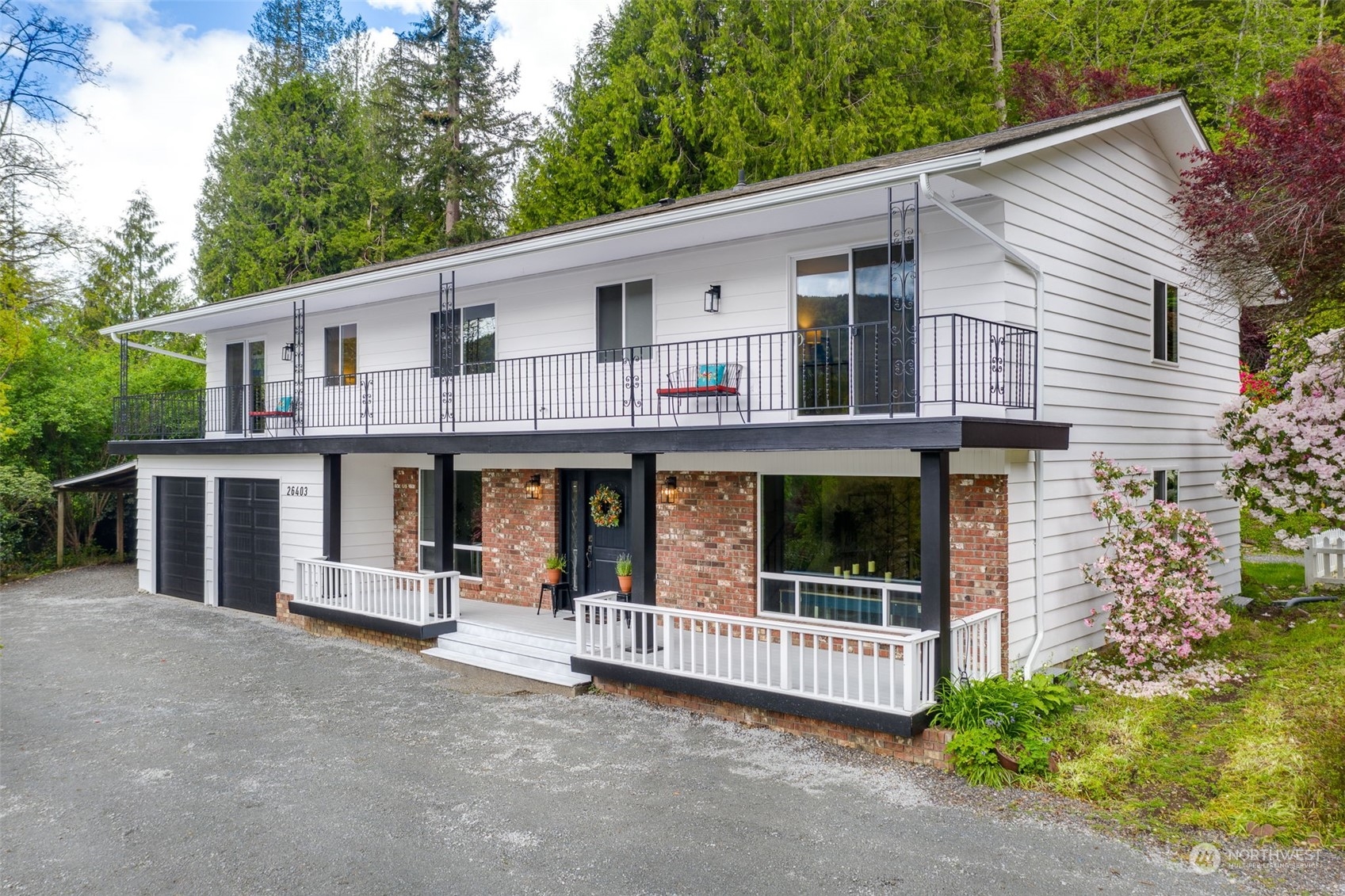 26403 Fern Bluff Road Monroe, WA 98272 - Photo 1 of 40 a front view of a house with porch