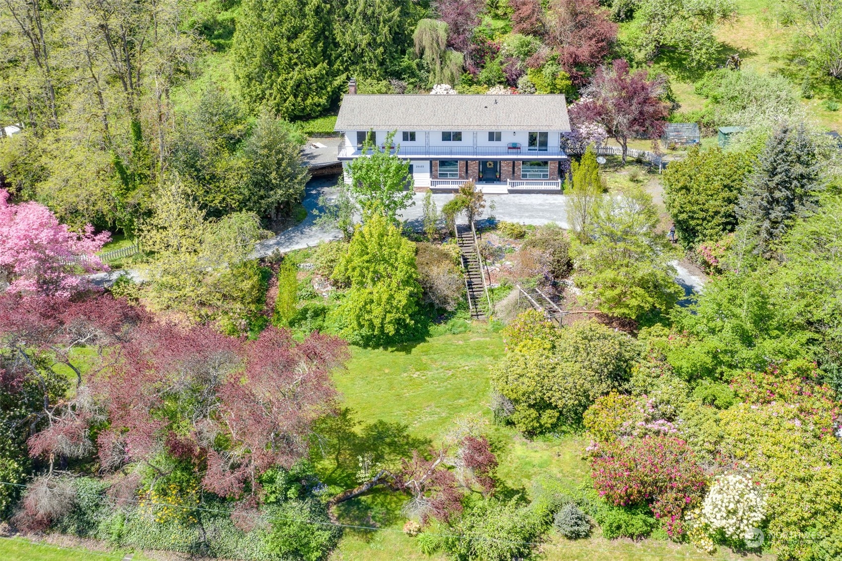 26403 Fern Bluff Road Monroe, WA 98272 - Photo 26 of 40 an aerial view of a house with a yard