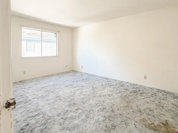 an empty room with a window