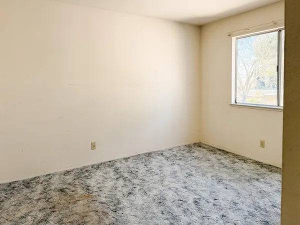 an empty room with a window