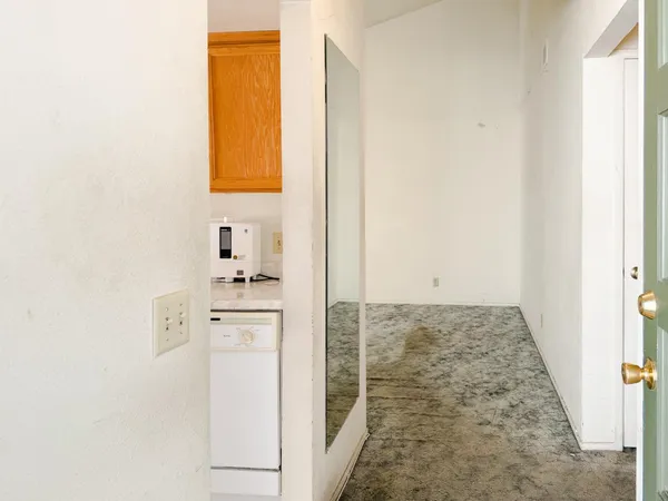 view of a kitchen with a sink