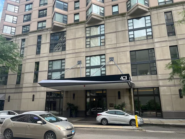 a view of a car parked in front of a building