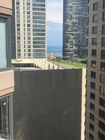 a view of swimming pool with outdoor seating