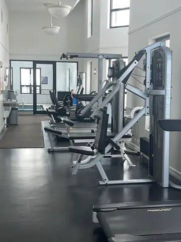 a view of a living room and dining room