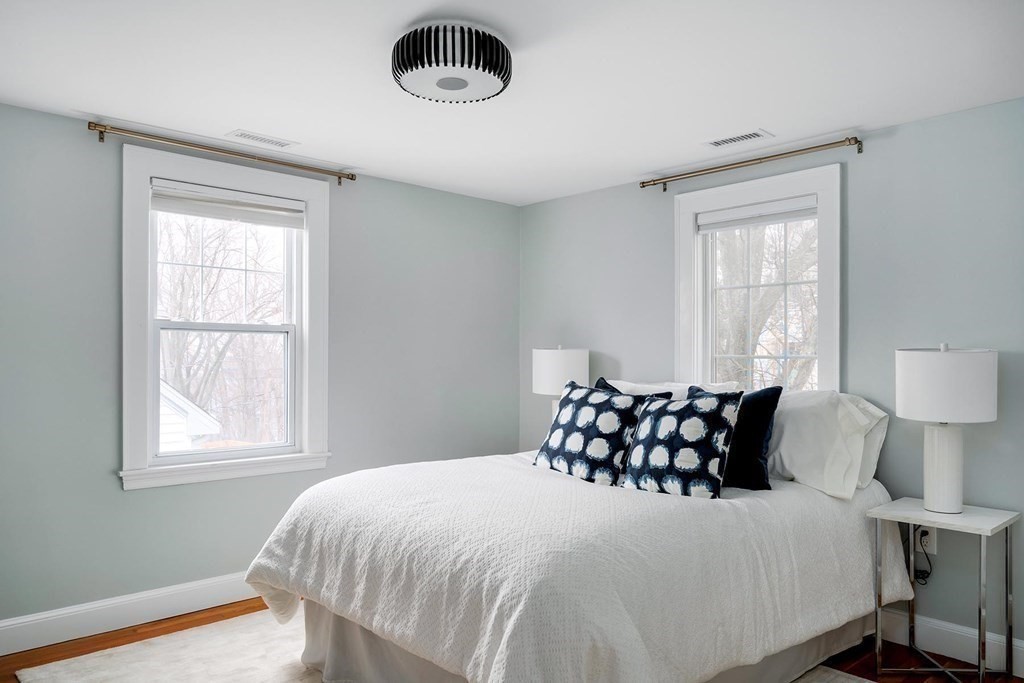 10 Jenness Road Brookline, MA 02446 - Photo 13 of 20 a bedroom with a bed and window