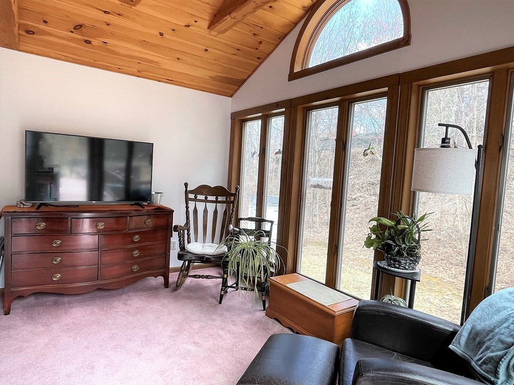15 Shepard Road Sturbridge, MA 01566 - Photo 15 of 38 a living room with furniture and a flat screen tv