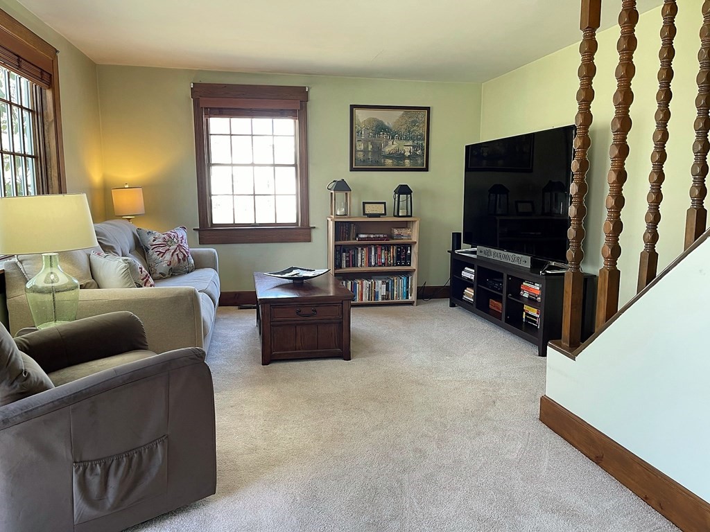 15 Shepard Road Sturbridge, MA 01566 - Photo 16 of 38 a living room with furniture and a flat screen tv