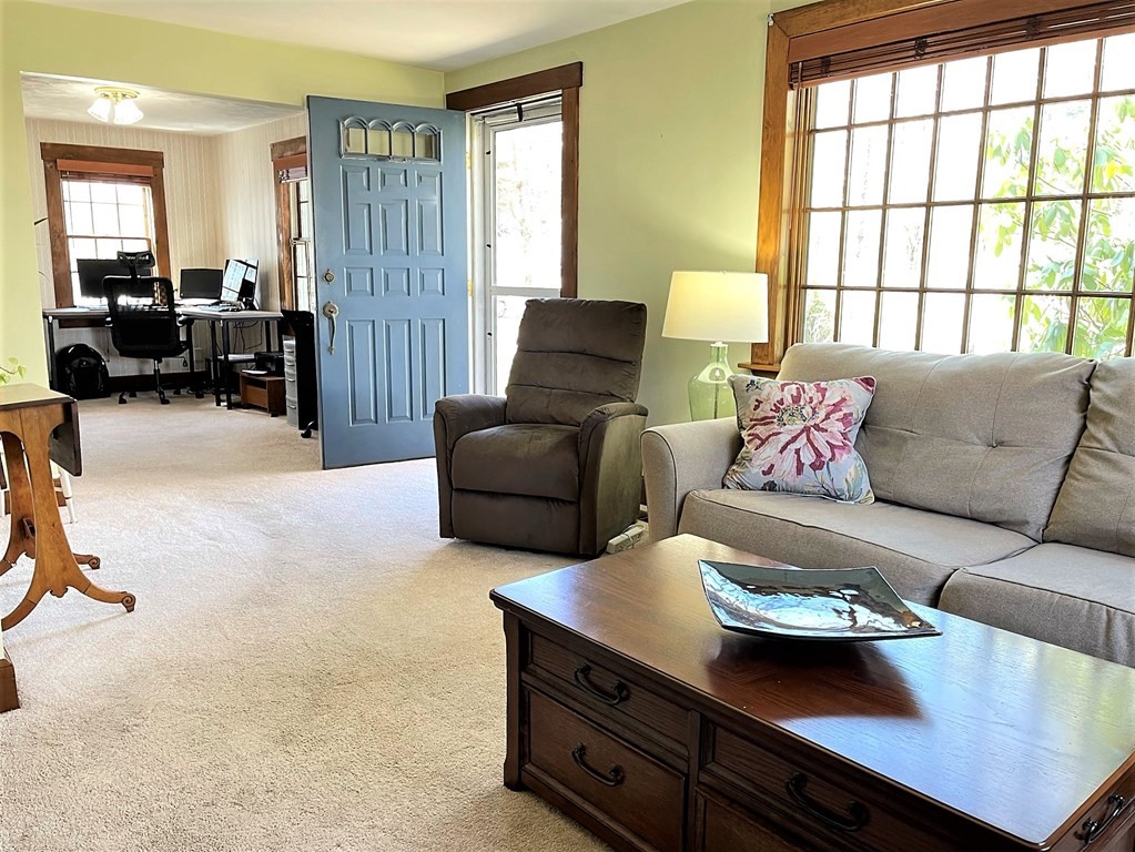 15 Shepard Road Sturbridge, MA 01566 - Photo 17 of 38 a living room with furniture and a window
