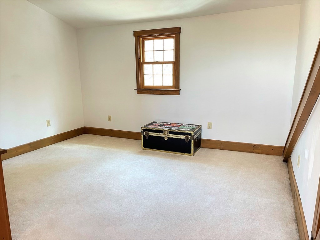 15 Shepard Road Sturbridge, MA 01566 - Photo 24 of 38 a room with a bed and a window