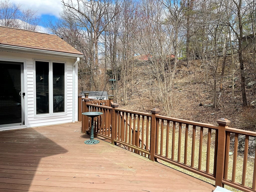15 Shepard Road Sturbridge, MA 01566 - Photo 37 of 38 a view of a balcony with wooden floor and fence