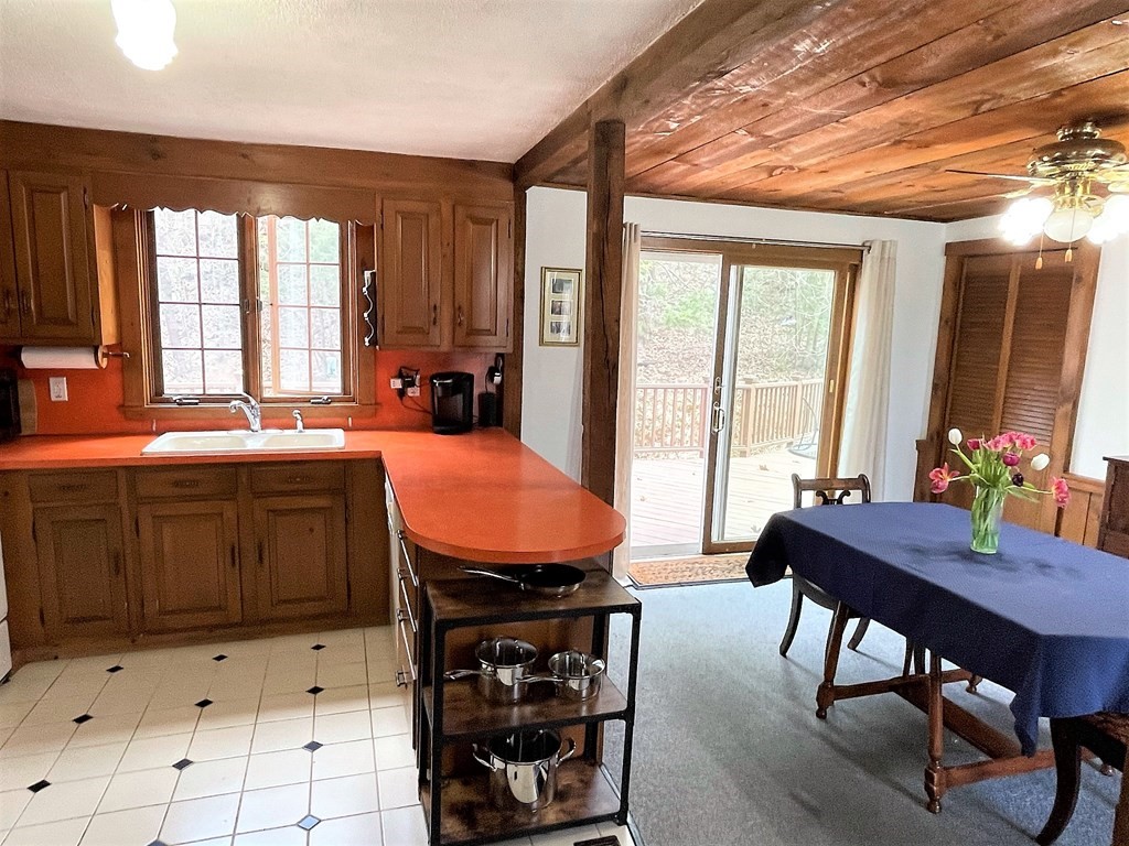 15 Shepard Road Sturbridge, MA 01566 - Photo 9 of 38 a bedroom with furniture and large windows