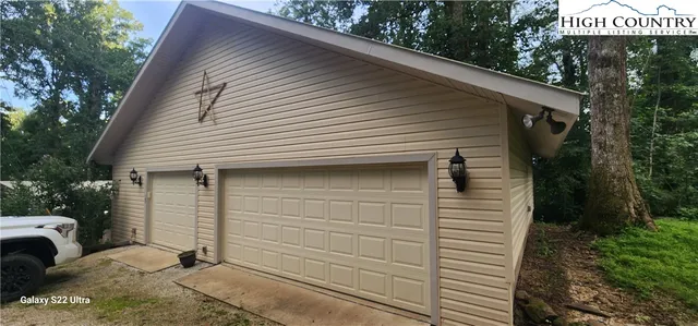 a outdoor space with lots of white furniture