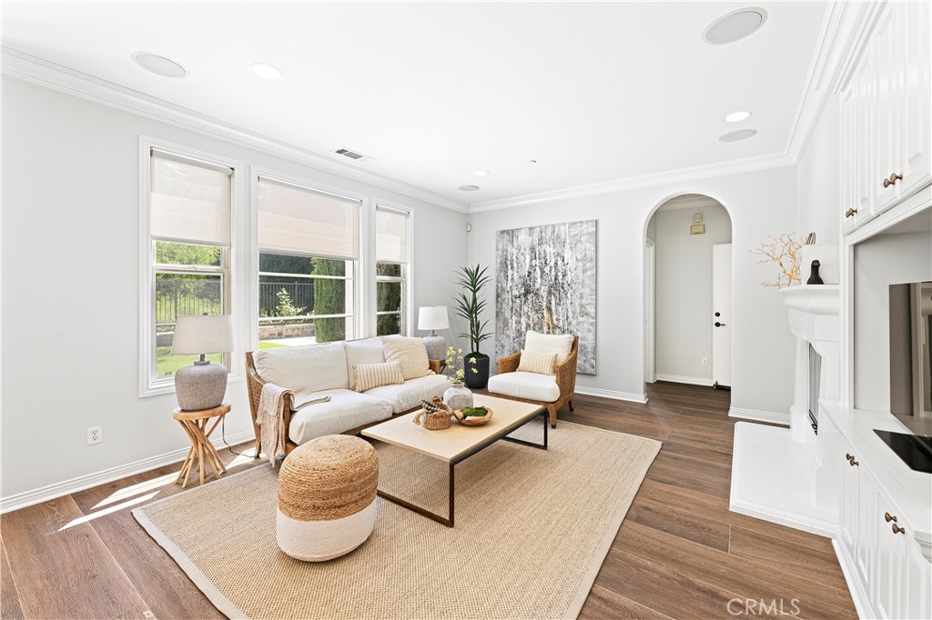 54 Valley Terrace Irvine, CA 92603 - Photo 19 of 60 a living room with furniture and a fireplace