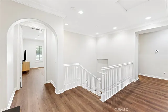 a bathroom with a shower sink and mirror
