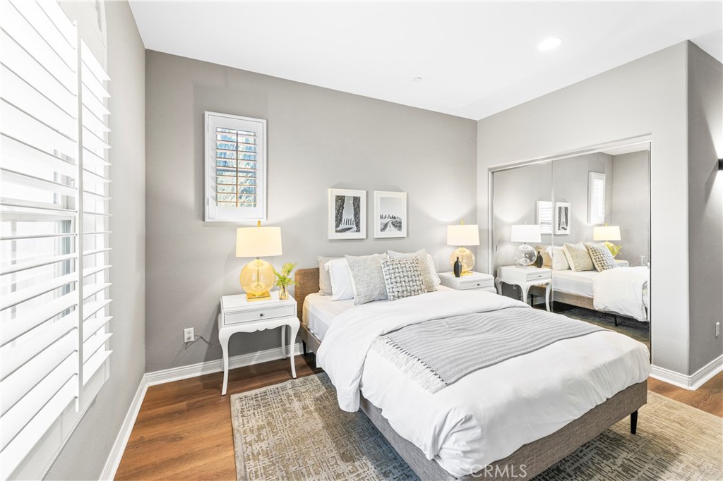 54 Valley Terrace Irvine, CA 92603 - Photo 44 of 60 a bedroom with a bed and a large window