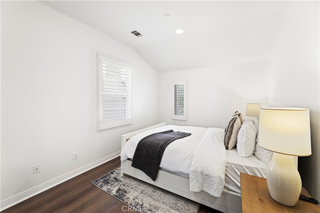 54 Valley Terrace Irvine, CA 92603 - Photo 49 of 60 a bedroom with a bed and a window