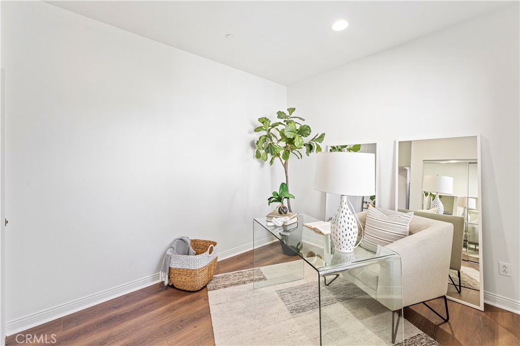 54 Valley Terrace Irvine, CA 92603 - Photo 54 of 60 a dining room with furniture and a potted plant