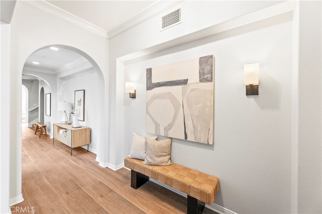 54 Valley Terrace Irvine, CA 92603 - Photo 6 of 60 a view of livingroom with furniture and wooden floor
